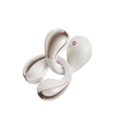 White QCY Crossky C30 earbuds arranged in artistic spiral pattern showing L/R indicators on light background.