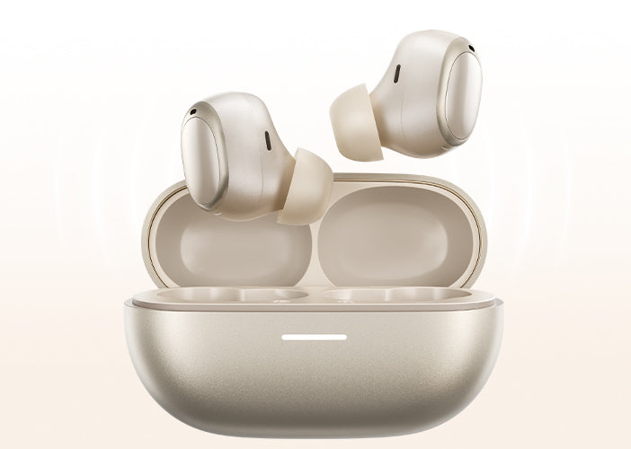 Auricolari wireless dorati con custodia di ricarica, eleganti e moderni.
