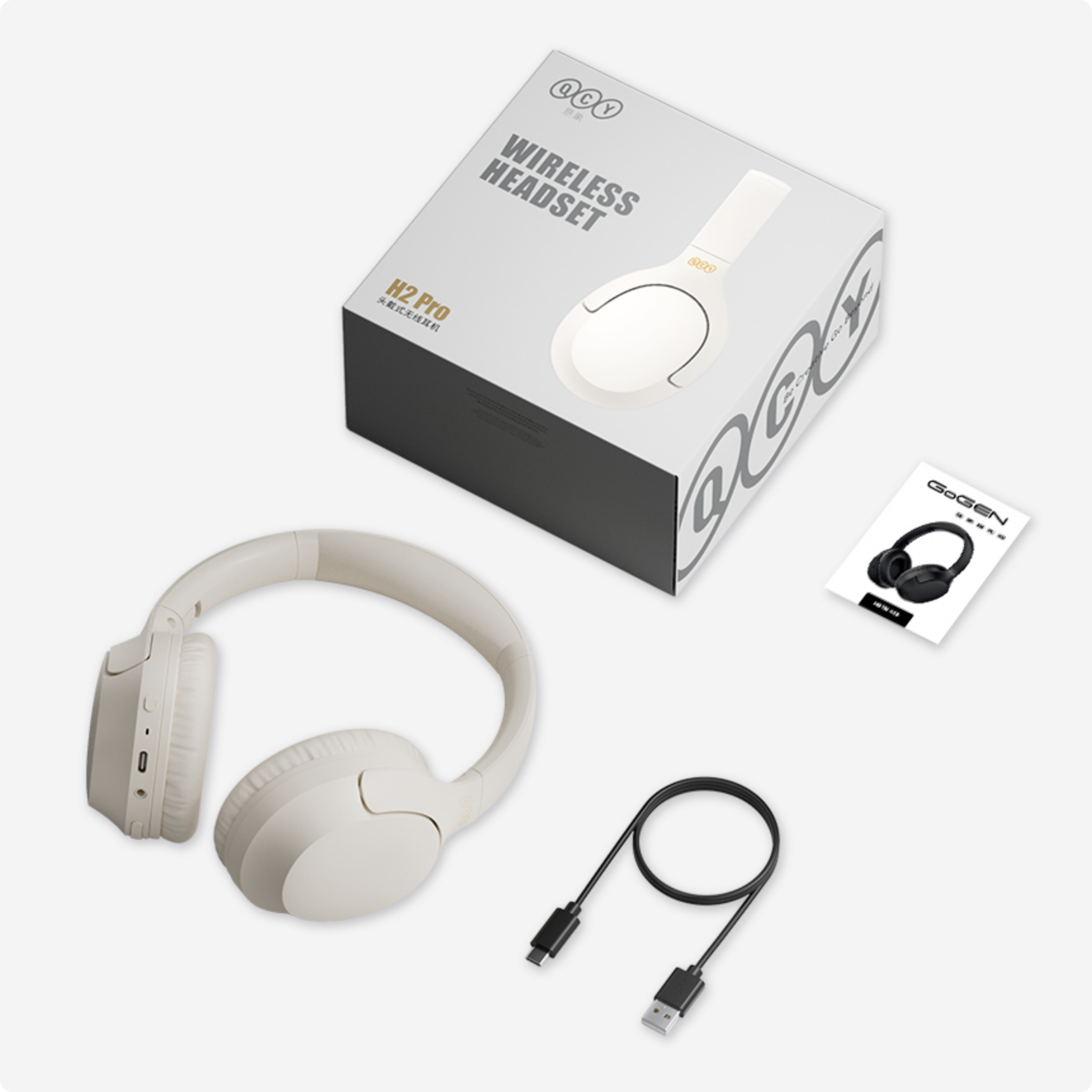 Cuffie wireless QCY H2 Pro – bianche, senza fili, con cavo di ricarica USB e manuale.