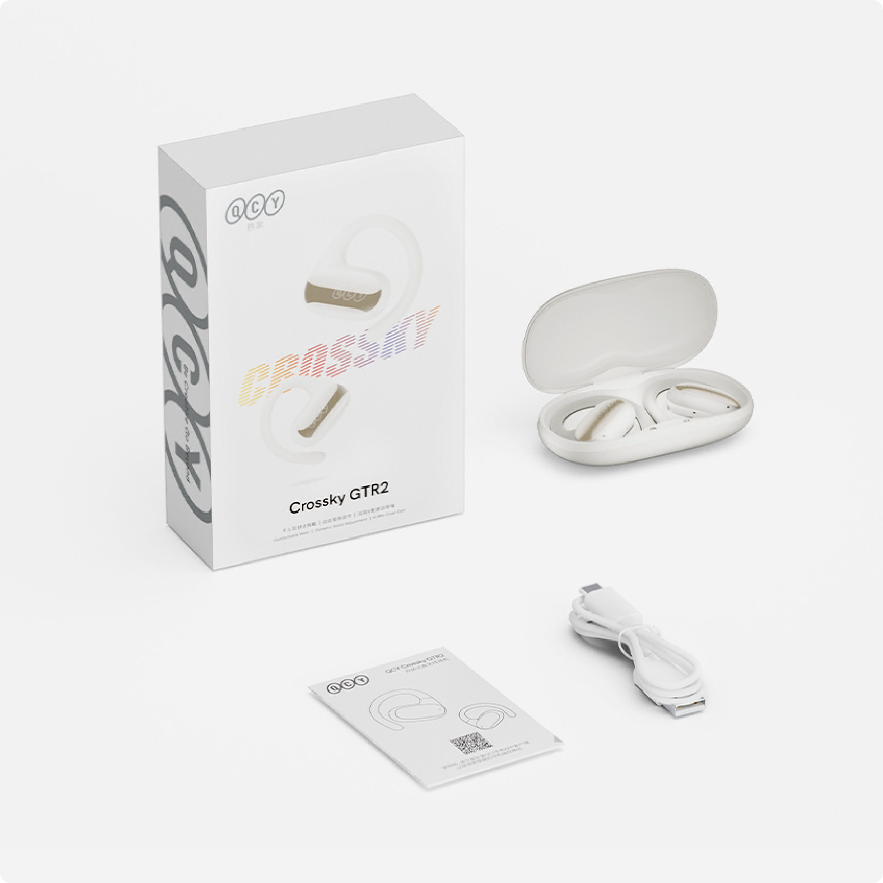 Cuffie Bluetooth QCY Crossky GTR2 bianche con custodia di ricarica, cavo USB e manuale.