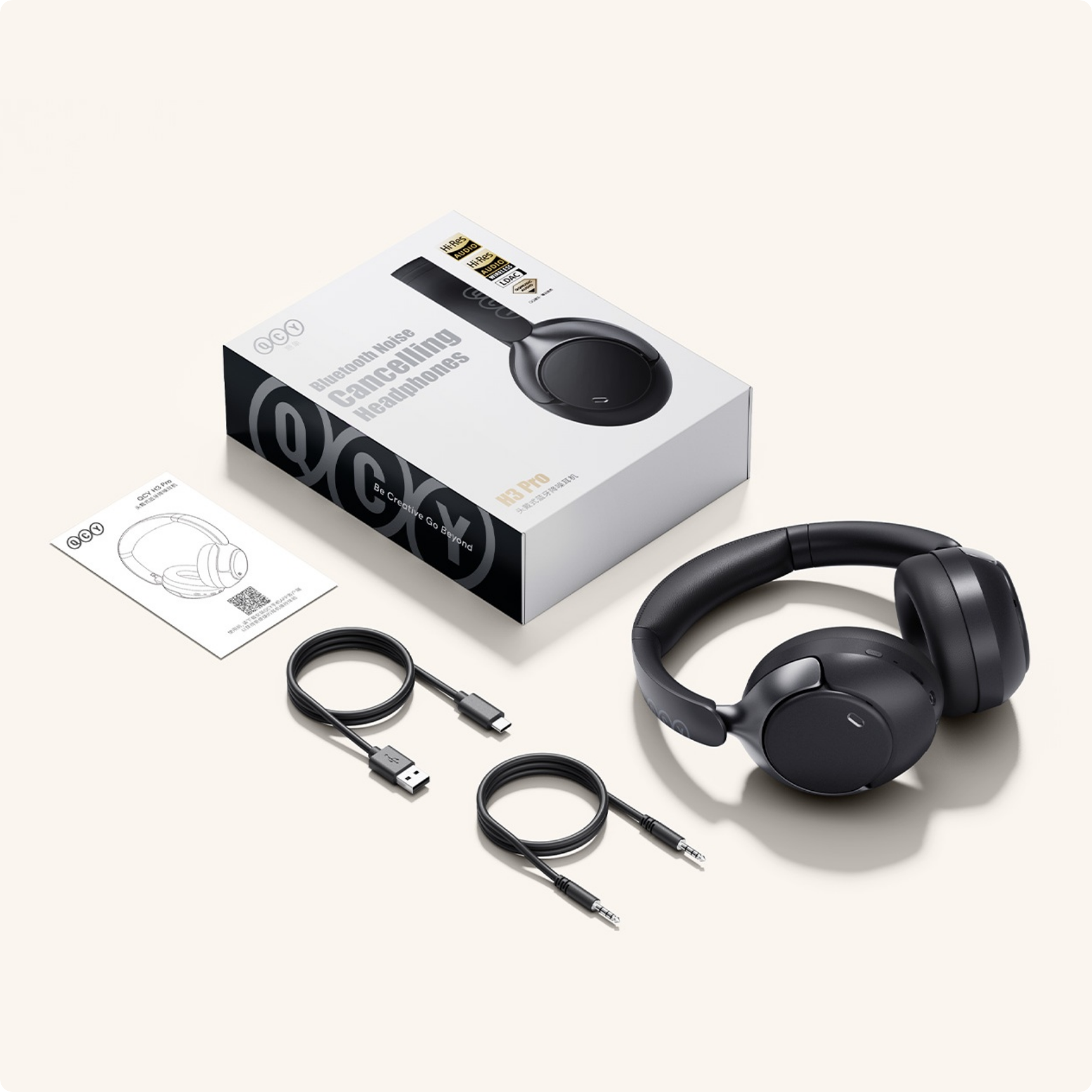 Cuffie Bluetooth QCY H3 Pro con cancellazione del rumore, cavi e confezione.