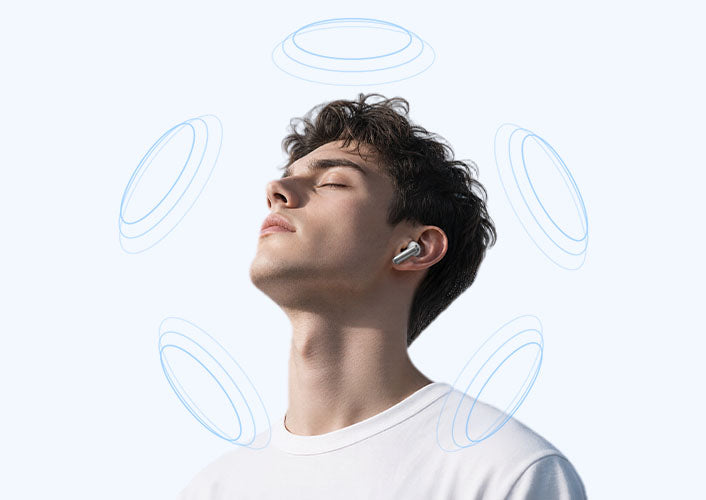 Giovane uomo con auricolari wireless, esperienza rilassante grazie alle onde sonore.