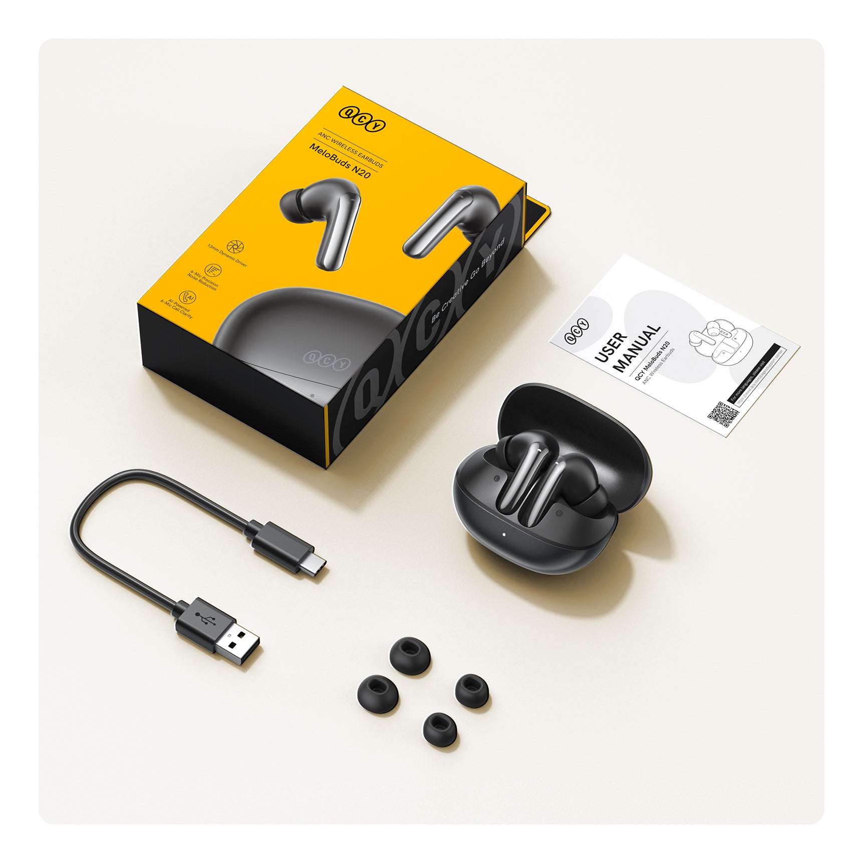 Cuffie Bluetooth QCY MeloBuds N20 ANC con custodia di ricarica, cavo USB-C e auricolari di ricambio.