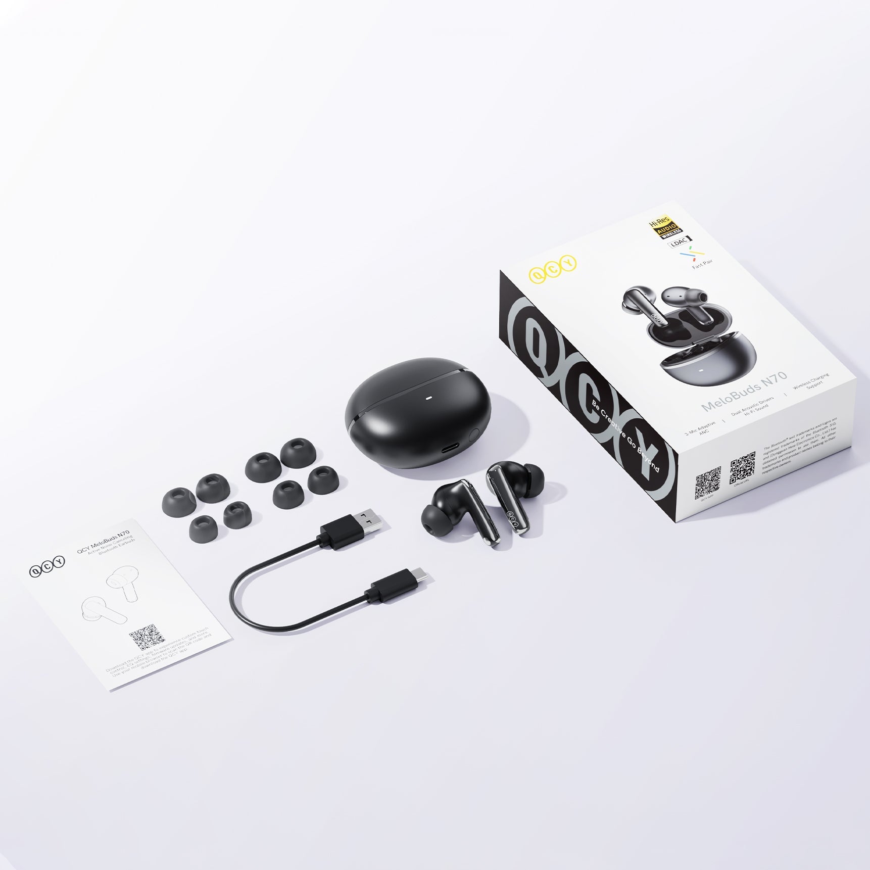 Cuffie True Wireless QCY MeloBuds N70 con custodia di ricarica, auricolari di ricambio e cavo USB-C.